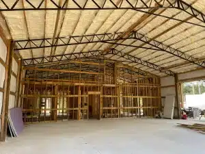 How to Fix Drafty Warehouses in Holley, FL with Commercial Insulation?