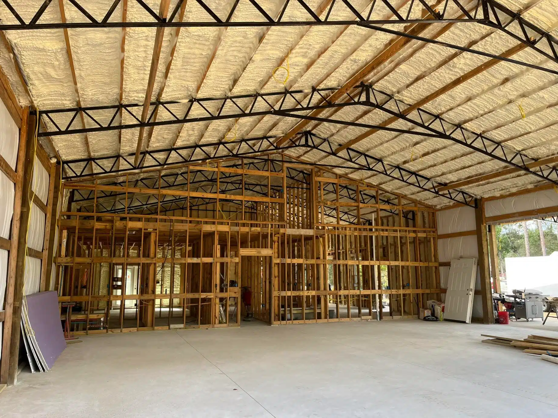 How to Fix Drafty Warehouses in Holley, FL with Commercial Insulation?